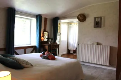 Un ou plusieurs lits dans un hébergement de l'établissement Chambre Douceur Angevine