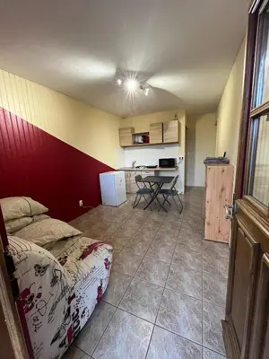 Cuisine ou kitchenette dans l'établissement Studio au Haras