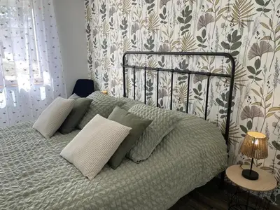 Un ou plusieurs lits dans un hébergement de l'établissement Gîte tranquille avec jardin à Savonnières - FR-1-381-634