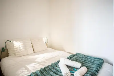 Un ou plusieurs lits dans un hébergement de l'établissement Le Rollin - Proche Hôpital- Netflix