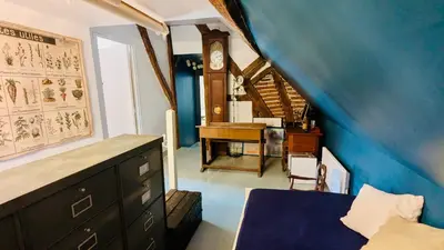 Coin salon dans l'établissement Bourg, familial, cour, la Maison d'Ouchet