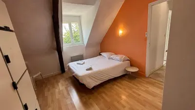 Un ou plusieurs lits dans un hébergement de l'établissement Maison familiale à la campagne