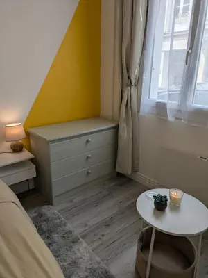 Un ou plusieurs lits dans un hébergement de l'établissement Appartement RDC Soleil