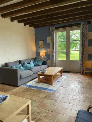 Coin salon dans l'établissement La Maison de Maître, Loire Gîte