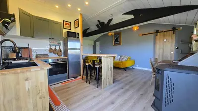 Cuisine ou kitchenette dans l'établissement Appartement de Charme