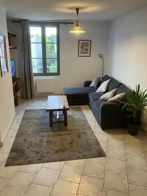 Coin salon dans l'établissement Grand appartement centre ville château St Pierre