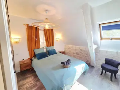 Un ou plusieurs lits dans un hébergement de l'établissement La Clef des Châteaux de la Loire, gîte cosy à la campagne avec accès piscine