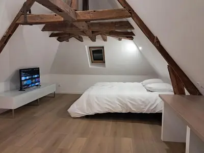 Un ou plusieurs lits dans un hébergement de l'établissement appartement 2 à 4 personnes vendome coeur de ville