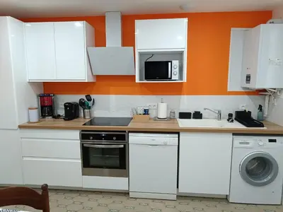 Cuisine ou kitchenette dans l'établissement location à saint martin le beau