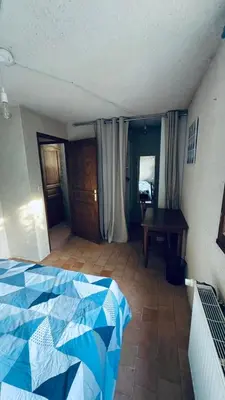 Un ou plusieurs lits dans un hébergement de l'établissement Gîte La Loge