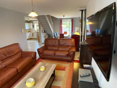 Télévision ou salle de divertissement dans l'établissement A pretty house with garden to rest in