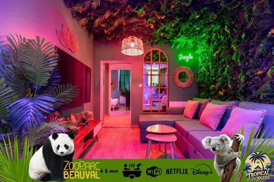 Coin salon dans l'établissement Le Jungle 5 min du Zoo