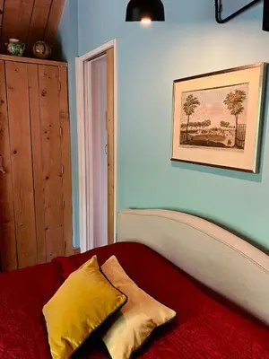 Un ou plusieurs lits dans un hébergement de l'établissement Une jolie Maison en bois au bord de l'Indre