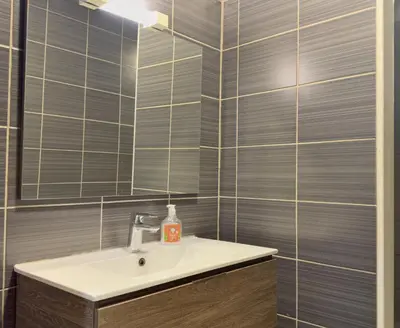 Salle de bains dans l'établissement Le Beige
