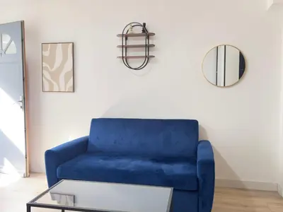Coin salon dans l'établissement Le Beige