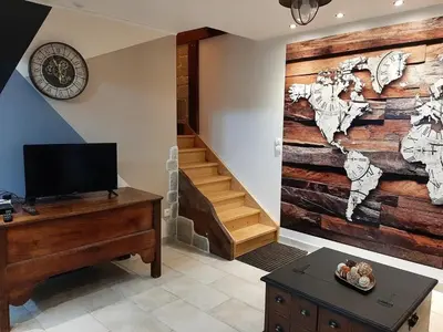 Télévision ou salle de divertissement dans l'établissement Maison accueillante à Clermont-Créans, 70m² avec jardin
