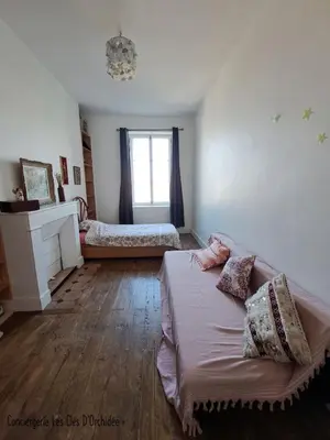 Un ou plusieurs lits dans un hébergement de l'établissement House Le Havre du Négociant