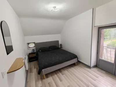 Un ou plusieurs lits dans un hébergement de l'établissement Maison familiale proche Zoo