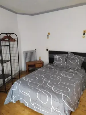 Un ou plusieurs lits dans un hébergement de l'établissement Chambre chez l'habitant