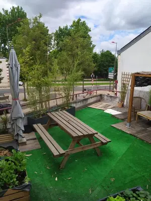 Jardin de l'établissement Chambre chez l'habitant