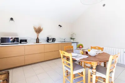 Cuisine ou kitchenette dans l'établissement Les Chambres du Méteil