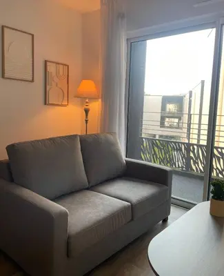 Coin salon dans l'établissement Zenao Appart'hôtels Tours