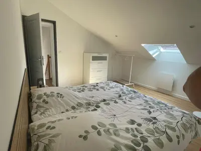 Un ou plusieurs lits dans un hébergement de l'établissement Maison au cœur du pays de Rabelais