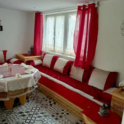 Coin salon dans l'établissement MAISON spacieuse