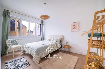 Un ou plusieurs lits dans un hébergement de l'établissement L'Envol chic - Parking privé - Centre du Mans