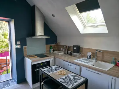 Cuisine ou kitchenette dans l'établissement Gite indépendant des Caves