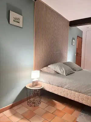 Un ou plusieurs lits dans un hébergement de l'établissement Manoir Les Touches - B&B