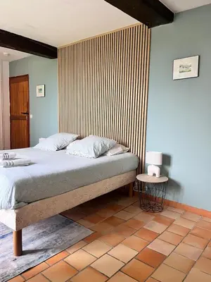 Un ou plusieurs lits dans un hébergement de l'établissement Manoir Les Touches - B&B