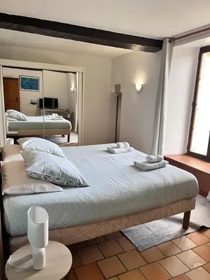 Un ou plusieurs lits dans un hébergement de l'établissement Manoir Les Touches - B&B