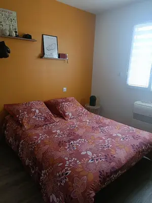 Un ou plusieurs lits dans un hébergement de l'établissement Chambre d'Hôtes