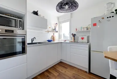 Cuisine ou kitchenette dans l'établissement Appartement Cocooning