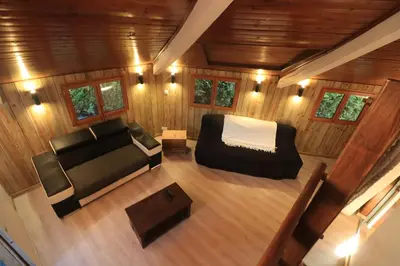 Coin salon dans l'établissement Gîte familial 15 personnes