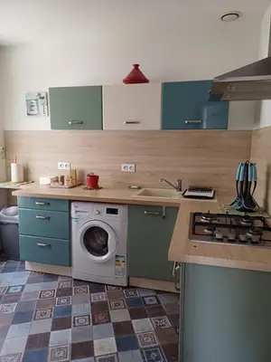 Cuisine ou kitchenette dans l'établissement Logement tout équipé centre ville
