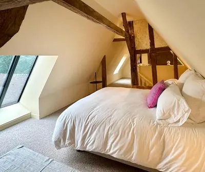 Un ou plusieurs lits dans un hébergement de l'établissement Auberge Radieuse