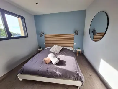Un ou plusieurs lits dans un hébergement de l'établissement Parenthèse contemporaine - Élégance et nature - 15 min du Circuit des 24h