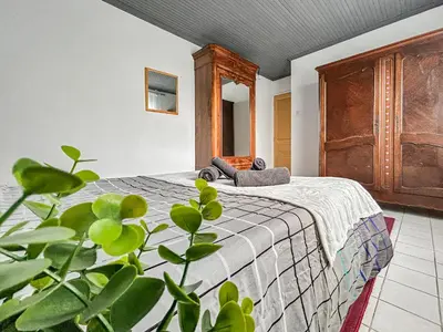 Un ou plusieurs lits dans un hébergement de l'établissement La maison Tinoli Escapade tranquille près d'Angers