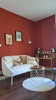 Coin salon dans l'établissement Jolie chambre en cœur de ville
