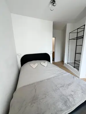Un ou plusieurs lits dans un hébergement de l'établissement Belle Maison tout confort bord de Loire