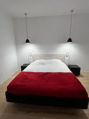 Un ou plusieurs lits dans un hébergement de l'établissement Belle Maison tout confort bord de Loire
