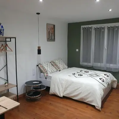 Un ou plusieurs lits dans un hébergement de l'établissement Soft, cosy, élégant, centre-ville