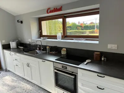 Cuisine ou kitchenette dans l'établissement La Maison du Clocher