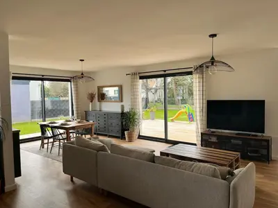 Télévision ou salle de divertissement dans l'établissement Maison 3 chambres