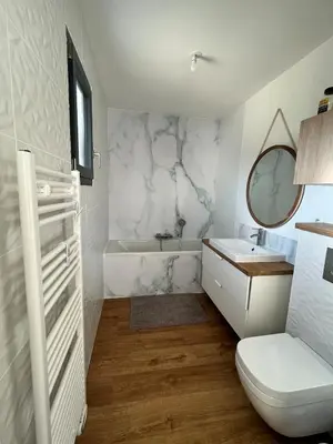 Un ou plusieurs lits dans un hébergement de l'établissement Maison 3 chambres