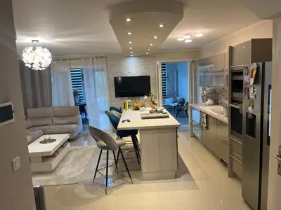 Cuisine ou kitchenette dans l'établissement Maison Chic à 10min du circuit des 24H