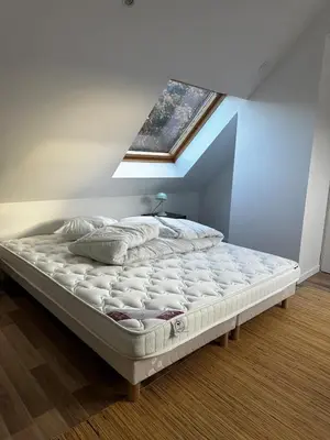 Un ou plusieurs lits dans un hébergement de l'établissement Charmante maison 2 Chambres à 10 mn d'Angers