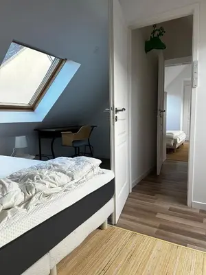 Un ou plusieurs lits dans un hébergement de l'établissement Charmante maison 2 Chambres à 10 mn d'Angers